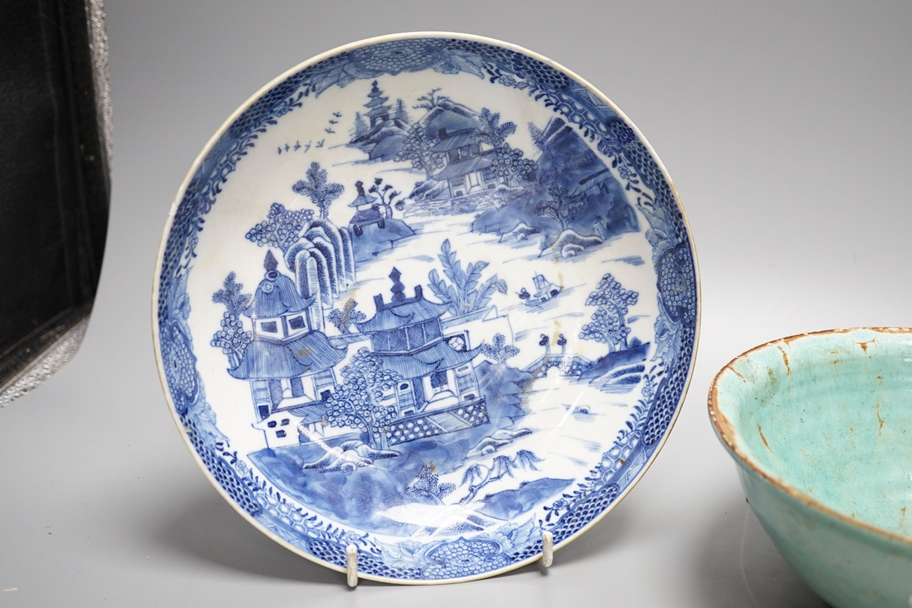 A 19th century blue and white dish, 22cm, together with three others